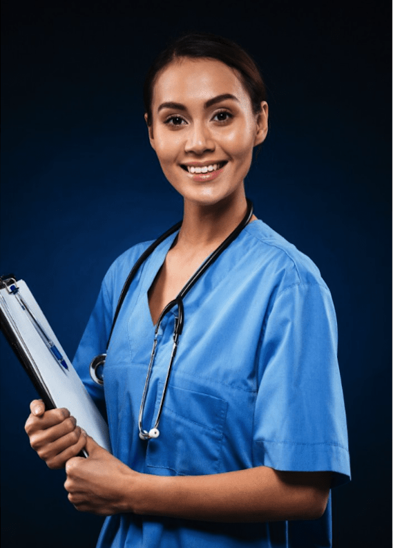 A woman in scrubs holding a clipboard.