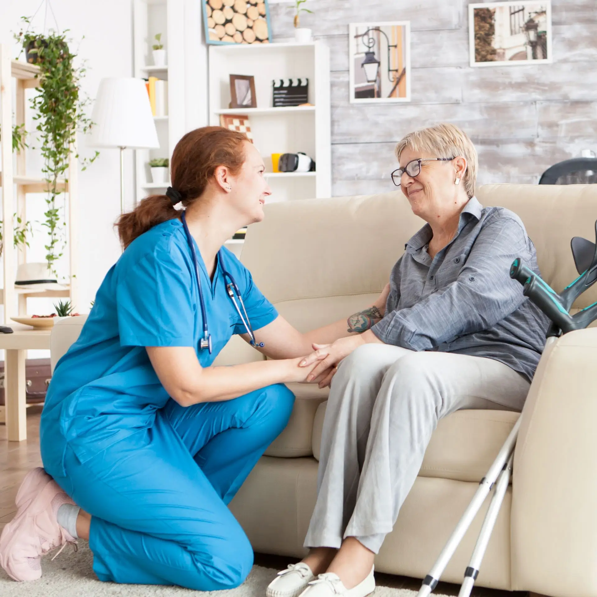 A nurse is talking to an elderly woman.